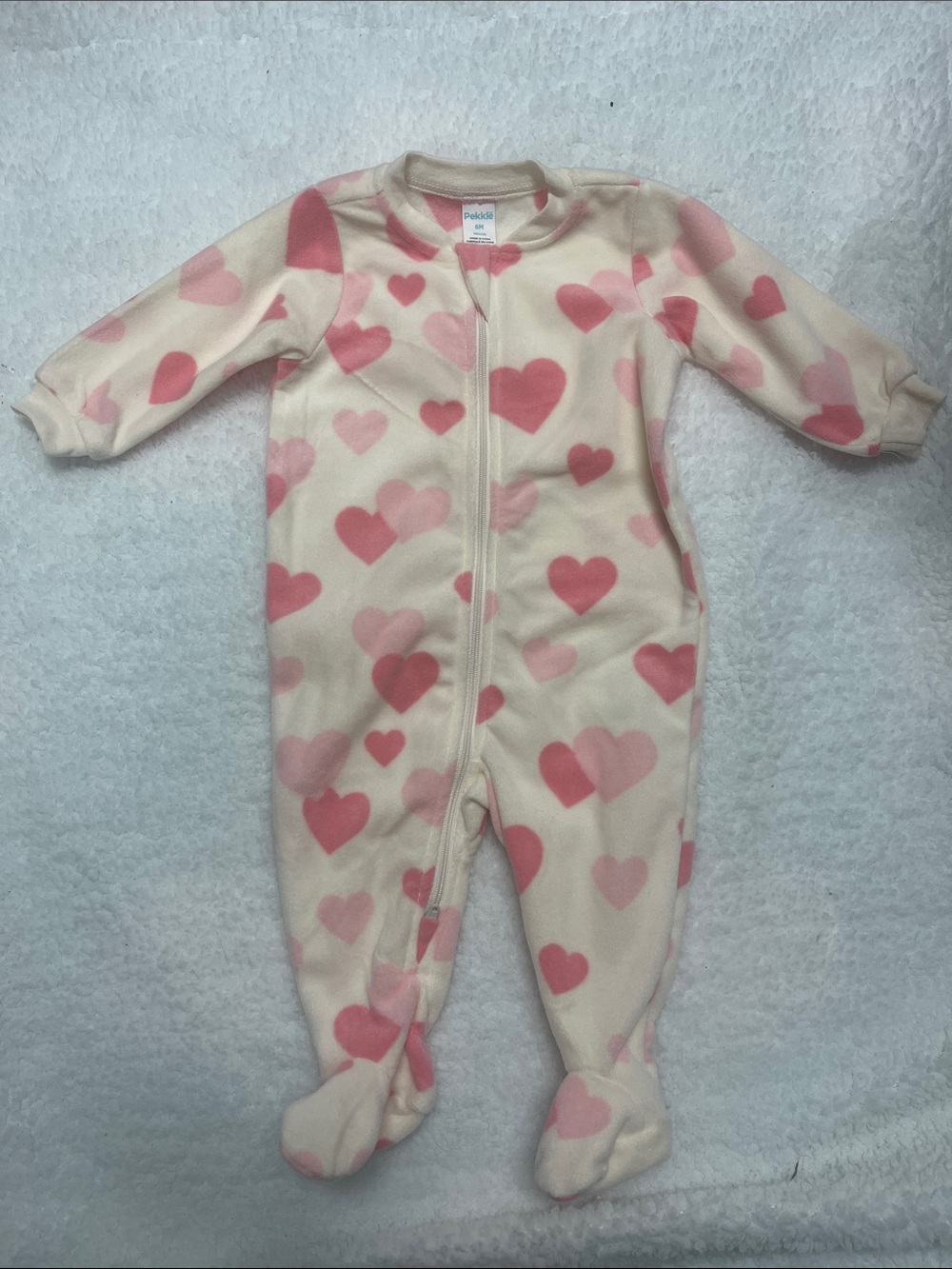 4/25$ Pekkle One-Piece Footed Fleece Sleeper in Cream with Pink Hearts -